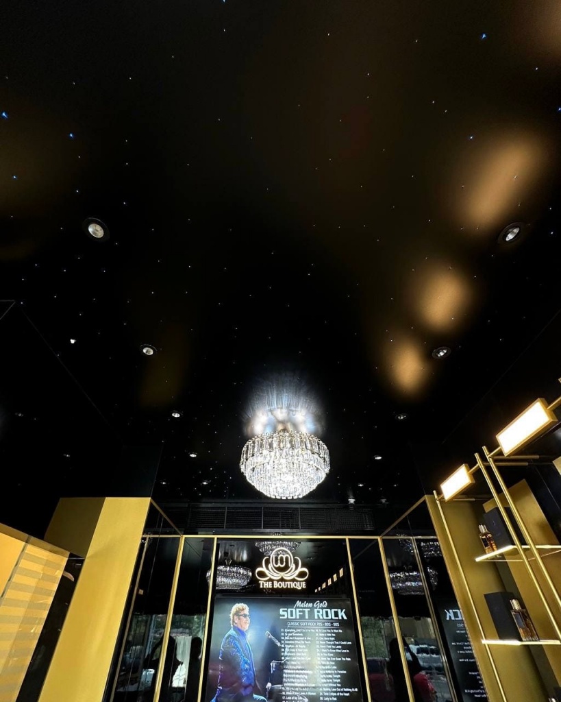 Custom glossy Black Star Ceiling installed in a luxury commercial interior with fiber optic stars. Custom glossy Black Star Ceiling installed in a luxury commercial interior with fiber optic stars.
