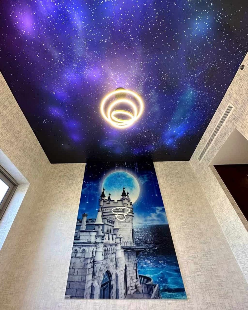 Luxury Galaxy Ceiling with printed nebula artwork and fiber optic stars installed in a modern villa in Dubai. Luxury Galaxy Ceiling with printed nebula artwork and fiber optic stars installed in a modern villa in Dubai.