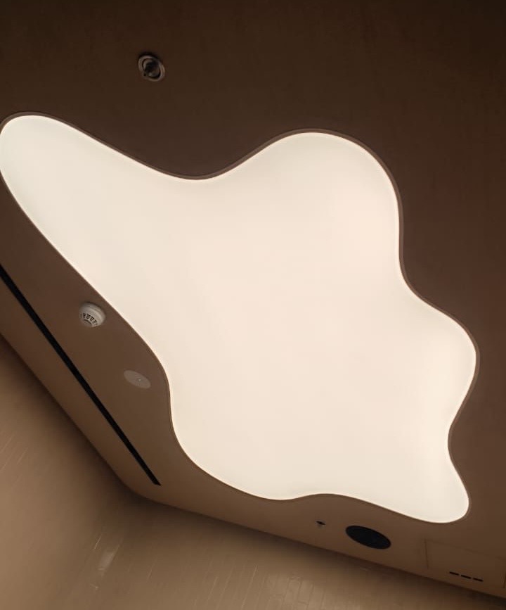 - Stretch Membrane: A flexible, durable PVC or fabric material is used to create the stretch ceiling. This membrane is mounted onto a frame or track system attached to the perimeter of the room. - Translucent Material: The membrane used in illuminated stretch ceilings is often translucent, allowing light to pass through while still maintaining a smooth, seamless surface.