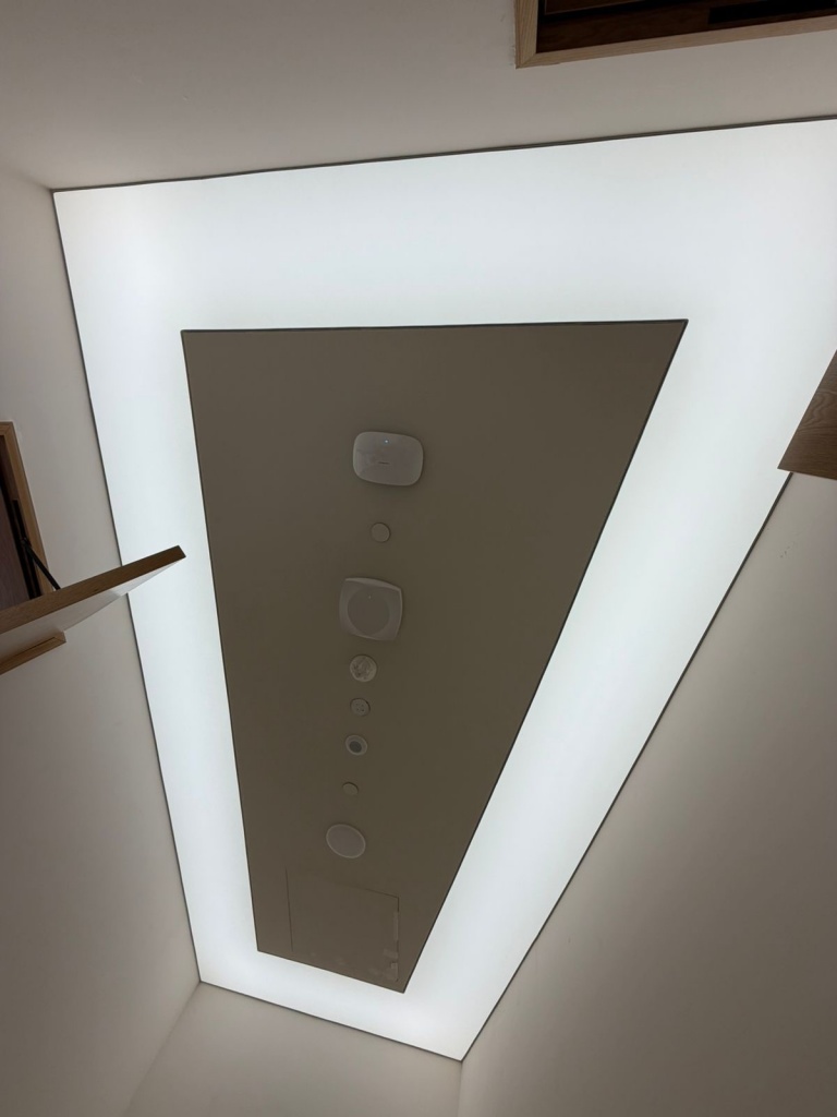 Translucent stretch ceiling with 6500K LED lighting in fitting room at Dubai Hills Mall clothing store