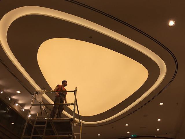 Professional ceiling installation in Dubai – LED lighting setup and frame preparation by experienced contractor Professional ceiling installation in Dubai – LED lighting setup and frame preparation by experienced contractor