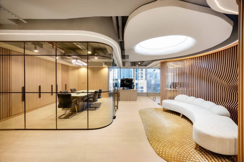 Custom curved illuminated ceiling integrated into gypsum board construction for a luxury corporate office interior in Dubai. Custom curved illuminated ceiling integrated into gypsum board construction for a luxury corporate office interior in Dubai.
