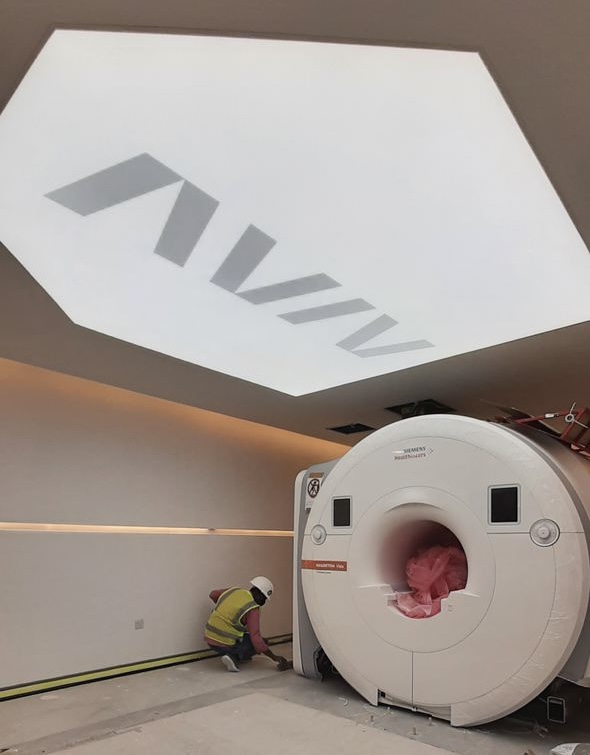 Modern MRI room stretch ceiling with bright 6500K LED lighting installed in a medical clinic in Dubai. Modern MRI room stretch ceiling with bright 6500K LED lighting installed in a medical clinic in Dubai.