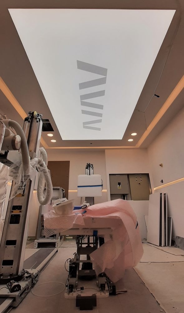 Professional stretch ceiling installation for a healthcare facility with uniform daylight LED illumination and modern design. Professional stretch ceiling installation for a healthcare facility with uniform daylight LED illumination and modern design.