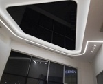 Black Glossy Stretch Ceiling for Tesla Service Center in Dubai International City