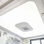 Stretch ceiling with backlit different shapes