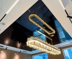 Black Glossy Stretch Ceiling with Luxury Chandelier in Bay Square Dubai